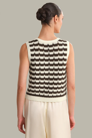 Model wearing the 525 Isla Striped Vest in Chalk Combo featuring a textured cream and brown striped knit, sleeveless silhouette, and button-front detail