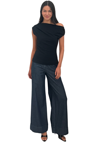 Trina Turk Roza Top in Black featuring a fitted silhouette and asymmetric draped neckline that falls softly across the shoulder.