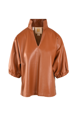 Emily McCarthy Poppy Top in Luggage Vegan Leather featuring a relaxed silhouette, stand collar, and short dolman sleeves.