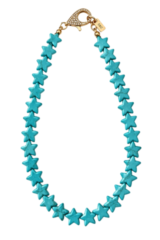 Smith & Co. Design Large Star Necklace in Turquoise featuring oversized vibrant turquoise star-shaped beads and a gold-plated lobster clasp.