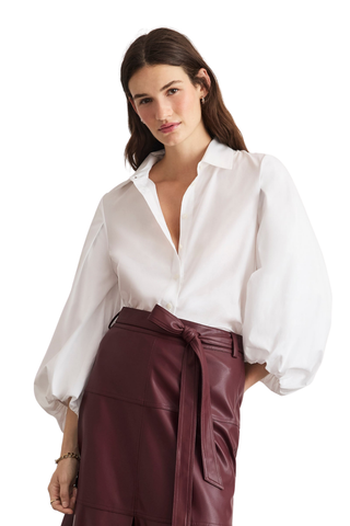 Tanya Taylor Marina Top in Optic White cotton shirting with a collared button front and voluminous long blouson sleeves.