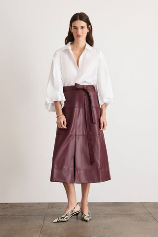 Tanya Taylor Marina Top in Optic White cotton shirting with a collared button front and voluminous long blouson sleeves.