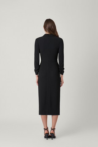 Shoshanna Corey Dress in Jet featuring a draped V-neckline, ruched three-quarter sleeves, fitted midi silhouette, and front slit.