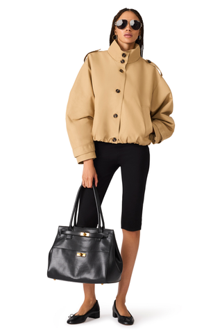Medium khaki utility jacket with a stand collar and oversized silhouette.