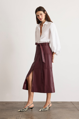 Tanya Taylor Marina Top in Optic White cotton shirting with a collared button front and voluminous long blouson sleeves.