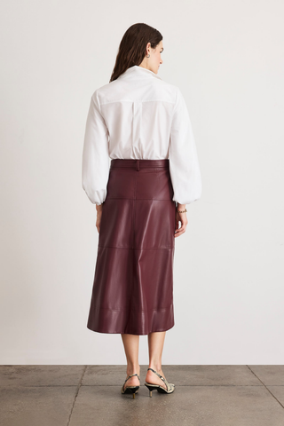 Tanya Taylor Marina Top in Optic White cotton shirting with a collared button front and voluminous long blouson sleeves.