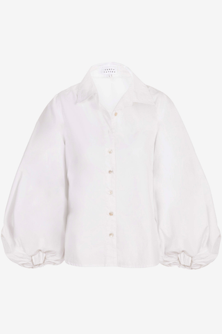 Tanya Taylor Marina Top in Optic White cotton shirting with a collared button front and voluminous long blouson sleeves.