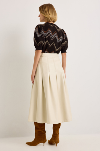 Marie Oliver Maddie Top in Electric featuring a multicolored neutral zigzag knit pattern, short puff sleeves, and ribbed crew neckline.