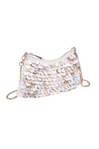 Rue Aveline Opalite Evening Bag in Ivory featuring layered shell-like embellishments and a detachable gold-tone chain strap.