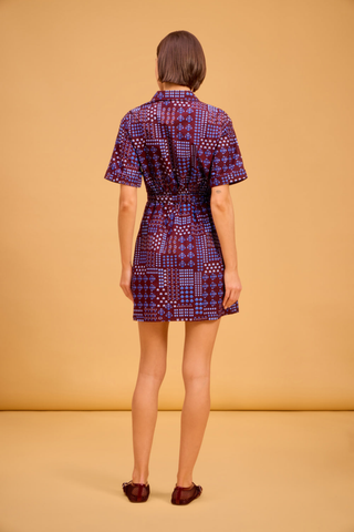 Olivia by Livro Tilly Dress in Alpine Sprigs featuring a burgundy and blue printed cotton poplin mini shirtdress with short sleeves, a collar, and a tie waist.
