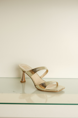 Dolce Vita Icelyn Heel in platinum metallic leather featuring a double strap mule silhouette, square toe, and sculptural flared heel