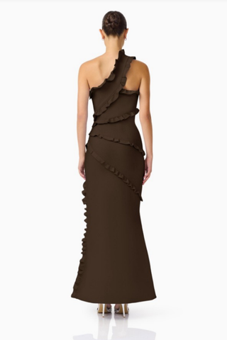 Elliatt Floriana Asymmetric Neck Gown in Brown with one-shoulder neckline, cascading ruffle detailing, floor-length skirt, and thigh-high side slit.
