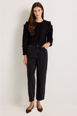 Marie Oliver Lindsay Sweater in Black featuring open-knit detailing, sculptural ruffles, and a classic crew neckline.