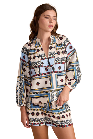 Model wearing Thomas & Lourdes Cora Top in Byzantine featuring a geometric scarf-inspired print and split neckline