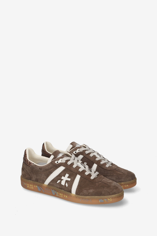 Premiata Bonnie-D 8576 Sneaker in rich brown with cream laces, signature logo detailing, and a low-profile sole.
