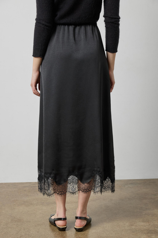 Lilla P Crepe Satin Lace-Trim Skirt in Black featuring a flowing midi silhouette, elastic waistband, and delicate lace detailing along the hem.