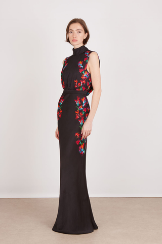 SALONI Gwen-C Dress in Equinox featuring a black base with red floral detailing, sleeveless high neckline, and floor-length flared skirt.