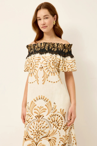Marie Oliver Lola Dress in Fleuron with off-the-shoulder neckline, relaxed column silhouette, and Mediterranean tile-inspired print in cream, tan, and black
