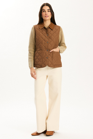 Tyler Boe Amoreena Vest in Bison brown featuring diamond quilting, a corduroy collar, snap-front closure, and patch pockets.
