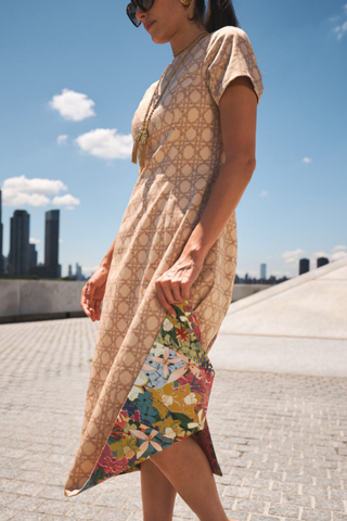 Mestiza Hampton Convertible Midi Dress in Midnight Meadows featuring a colorful floral print, short sleeves, and a column-style midi silhouette.