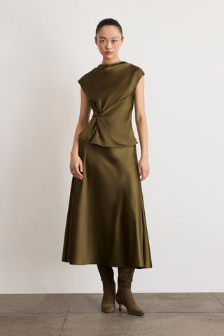 Tanya Taylor Robin Top in Fern olive green satin crepe with a mock neckline, cap sleeves, and twisted waist detail.