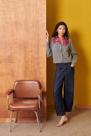 Celia B Brisana Cardigan in grey with pink floral collar detailing, colorful buttons, and long sleeves.