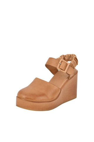 Antelope Tess Wedge in Taupe with hand-brushed leather upper, closed toe, slingback strap, and chunky platform wedge heel.