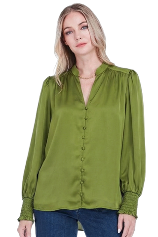Caper green blouse with covered buttons and long sleeves.