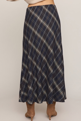 Z Supply Crestview Plaid Skirt in Eclipse featuring a dark neutral plaid pattern, bias-cut midi silhouette, and flowing hem.