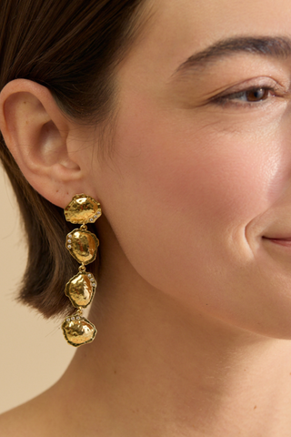 Brackish French Quarter Drop Earrings in Gold featuring cascading organic shapes, radiant 18k gold plating, and sparkling cubic zirconia accents.
