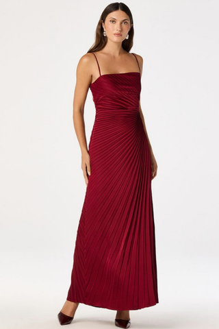 ASTR Paulette Dress in Wine featuring spaghetti straps, draped neckline, pleated floor-length silhouette, and thigh-high side slit.