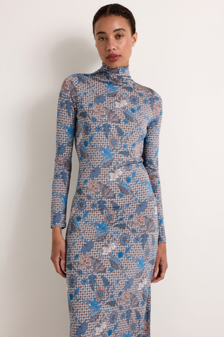 Marie Oliver Paxton Dress in Aegean featuring a blue printed stretch jersey, long sleeves, turtleneck, and body-skimming silhouette.