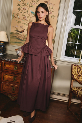 Love the Label Earnshaw Top in Deep Mahogany featuring a sleeveless fitted bodice with a softly flared peplum-style hem.