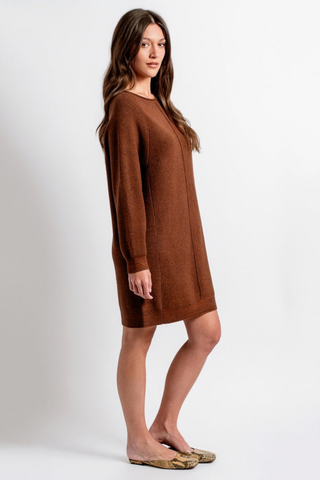 Kerisma Assima Sweater Dress in Brownie featuring a rich chocolate brown knit, long raglan sleeves, center-front piping, and a relaxed mini silhouette.