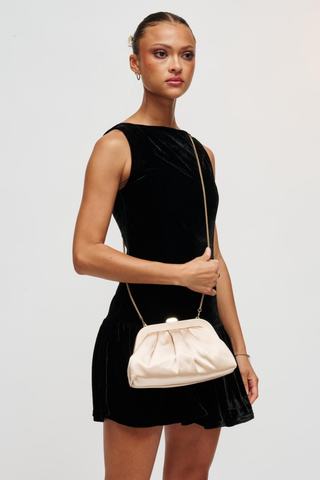 Urban Expressions Winter Clutch in Champagne with soft pleating, polished metal frame, kiss-lock clasp, and slender chain strap.