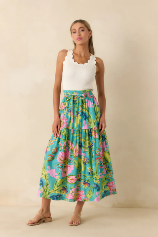 Colorful floral tiered midi skirt with self-tie waist detail in turquoise, pink, and green print by Prosperina