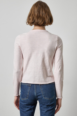 Woman wearing the Lilla P Vintage Bias Tee in Roseblush, a fitted blush pink long-sleeve cotton tee.