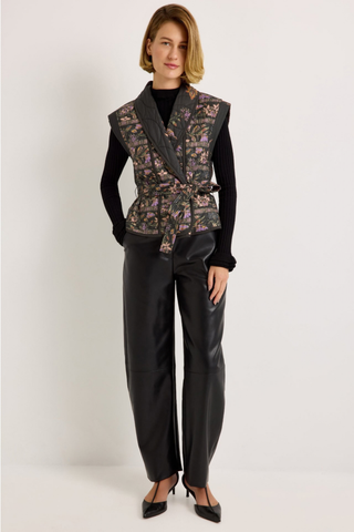 Marie Oliver Harlow Pant in Black featuring sleek vegan leather, a fitted waist, and modern barrel-leg silhouette.