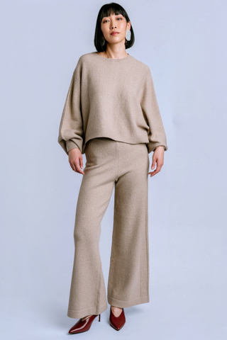 Kerisma Echo Sweater in Warm Wheat featuring an oversized crew neckline, relaxed dolman sleeves, and soft marled knit texture.