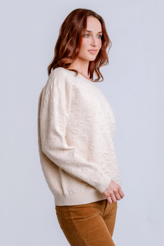 Kerisma Clyde 'Leo' Sweater in Ecru featuring a soft crew neckline and subtle tonal leopard relief texture.