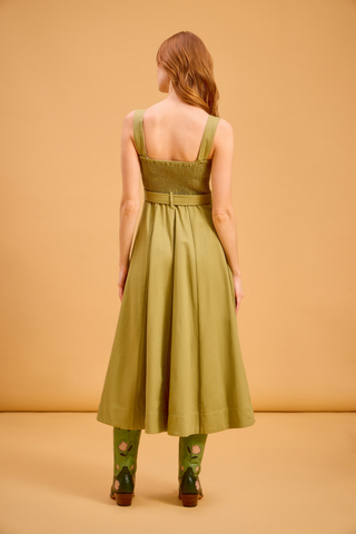 Olivia by Livro Foster Dress in Olive featuring a sleeveless midi silhouette, waist tie, and full skirt.