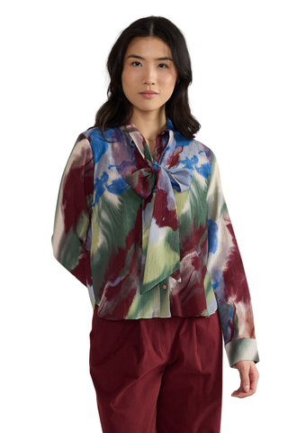 Thomas & Lourdes Eugenie Top in Hillside Wash featuring an abstract multicolor print with burgundy, blue, green, and neutral tones.