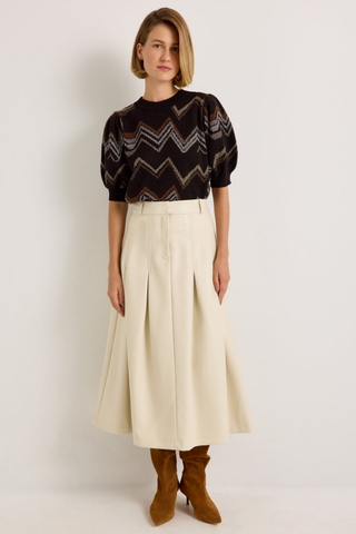 Marie Oliver Maddie Top in Electric featuring a multicolored neutral zigzag knit pattern, short puff sleeves, and ribbed crew neckline.