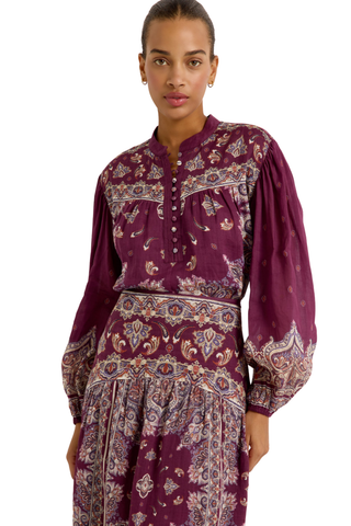 Rhiannon Top in Majesty featuring a rich purple paisley print, stand collar, button front, and full gathered long sleeves.