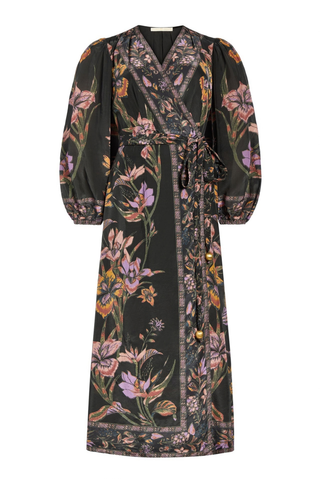 Marie Oliver Everette Dress in Nightshade featuring a dark floral placement print, wrap silhouette, long puff sleeves, and maxi length.