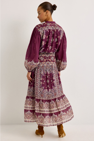 Rhiannon Top in Majesty featuring a rich purple paisley print, stand collar, button front, and full gathered long sleeves.