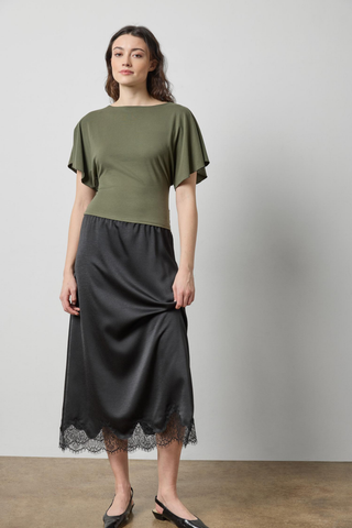Lilla P Crepe Satin Lace-Trim Skirt in Black featuring a flowing midi silhouette, elastic waistband, and delicate lace detailing along the hem.