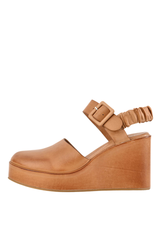 Antelope Tess Wedge in Taupe with hand-brushed leather upper, closed toe, slingback strap, and chunky platform wedge heel.
