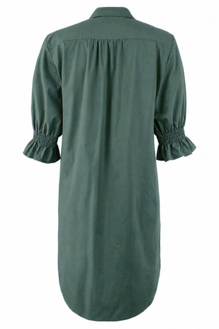 Finley Miller Dress in Jade featuring a green and blue cross-dyed fabric, spread collar, button-front closure, puff sleeves with smocked cuffs, and relaxed above-the-knee silhouette.