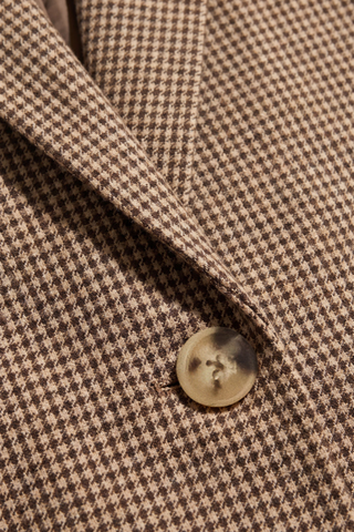 Z Supply Evan Check Blazer in Dark Chocolate brown houndstooth featuring a relaxed fit, notch collar, button front, and flap pockets.